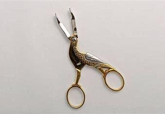 Pince à sucre cigogne